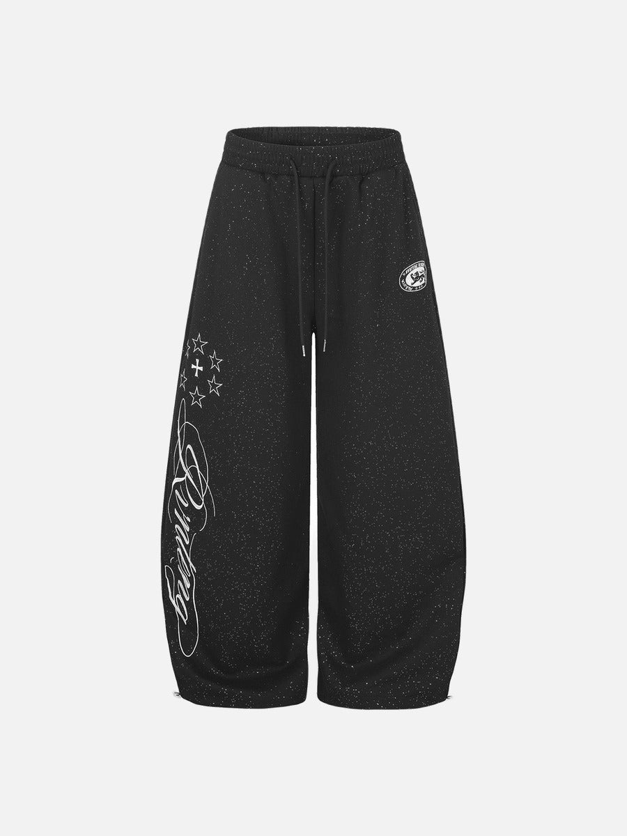 Front view of wide-leg embroidered fleece sweatpants in a relaxed fit