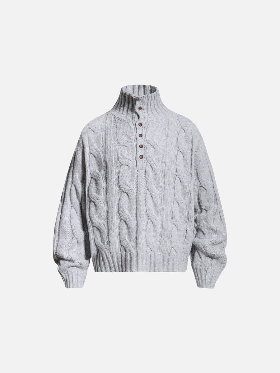 Cable knit mock neck jumper shown from the front