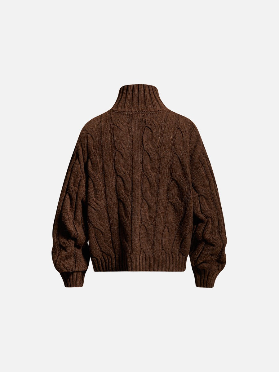 Back view of the textured cable knit jumper