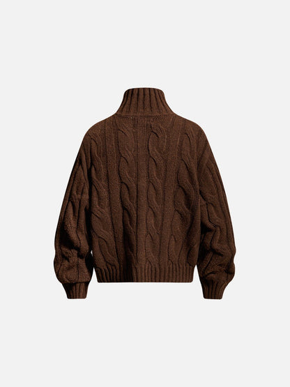 Back view of the textured cable knit jumper
