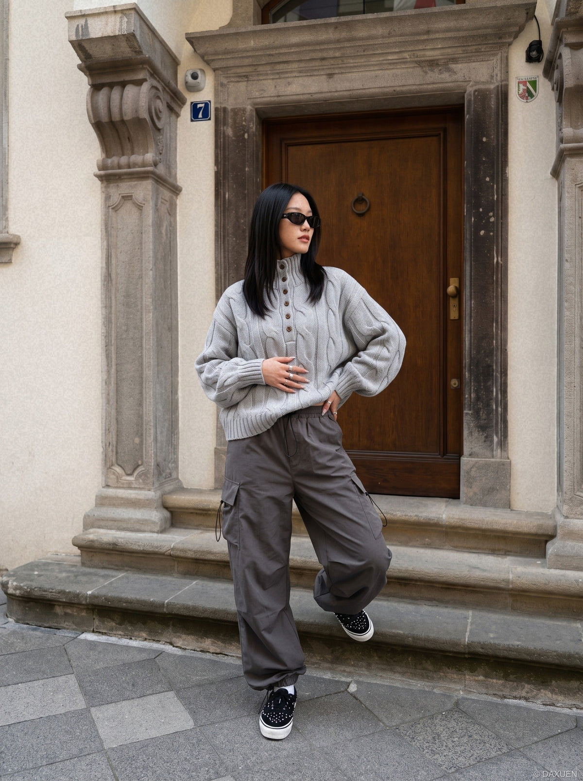 Mock neck detail on a cable knit jumper