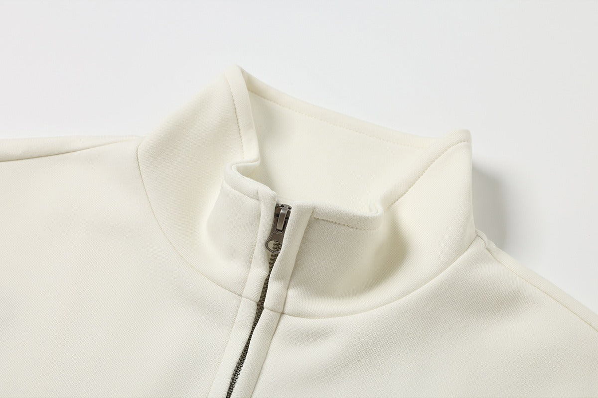 Jacket shown with the treble clef graphic centred on the back