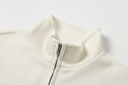 Jacket shown with the treble clef graphic centred on the back