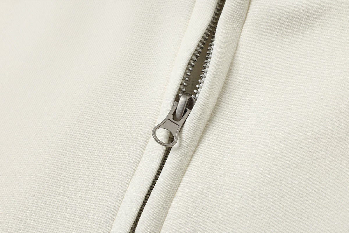 Detailed view of the treble clef graphic on the jacket