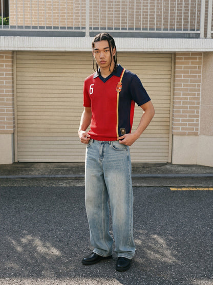 Colour block polo shirt with number graphic shown on a model