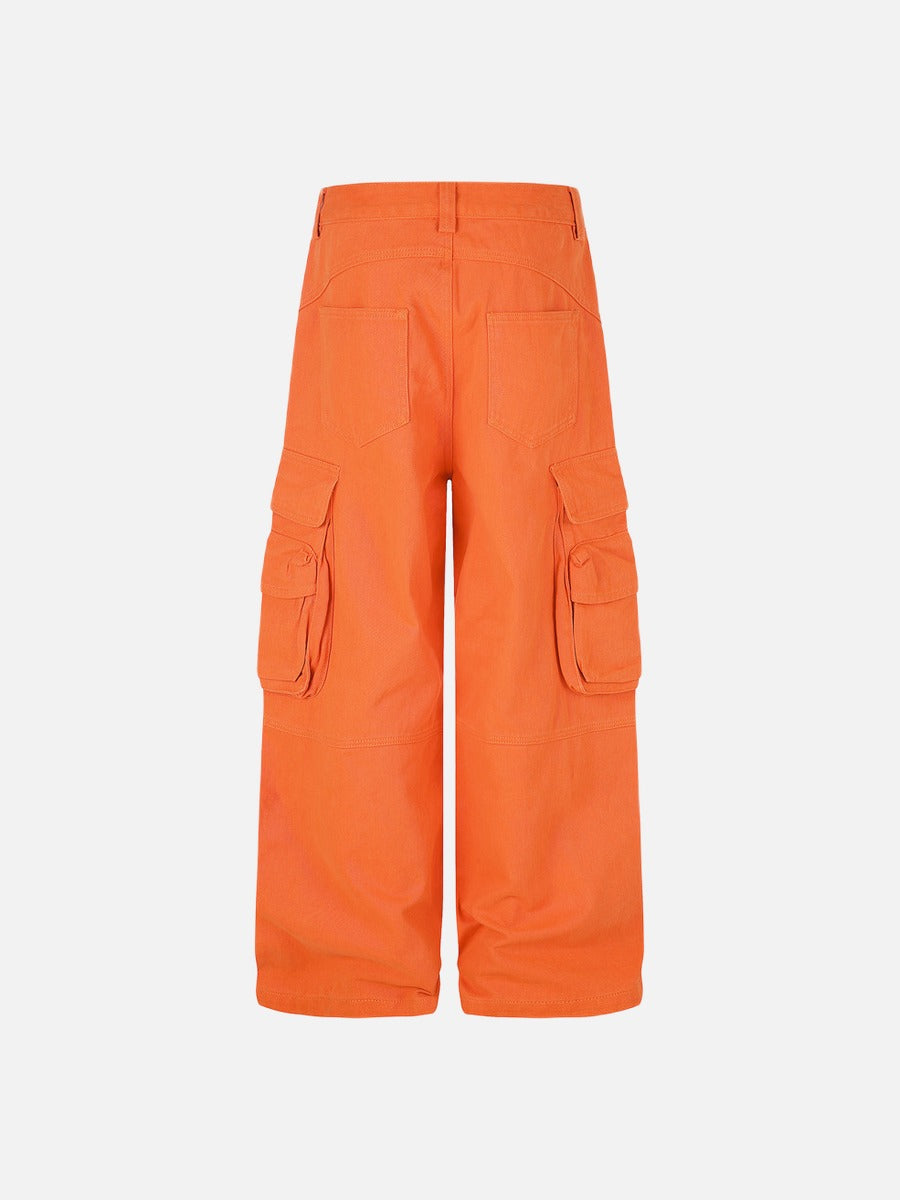 Close-up of the cargo pocket detail on orange trousers