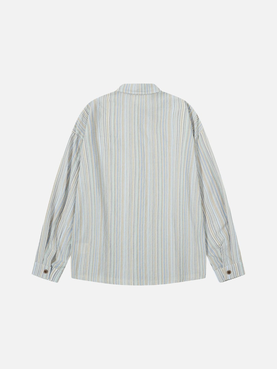 Angled front view of the relaxed fit striped button-up shirt