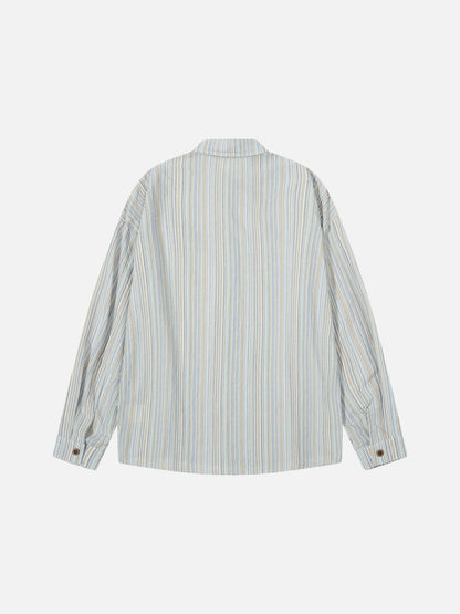 Angled front view of the relaxed fit striped button-up shirt