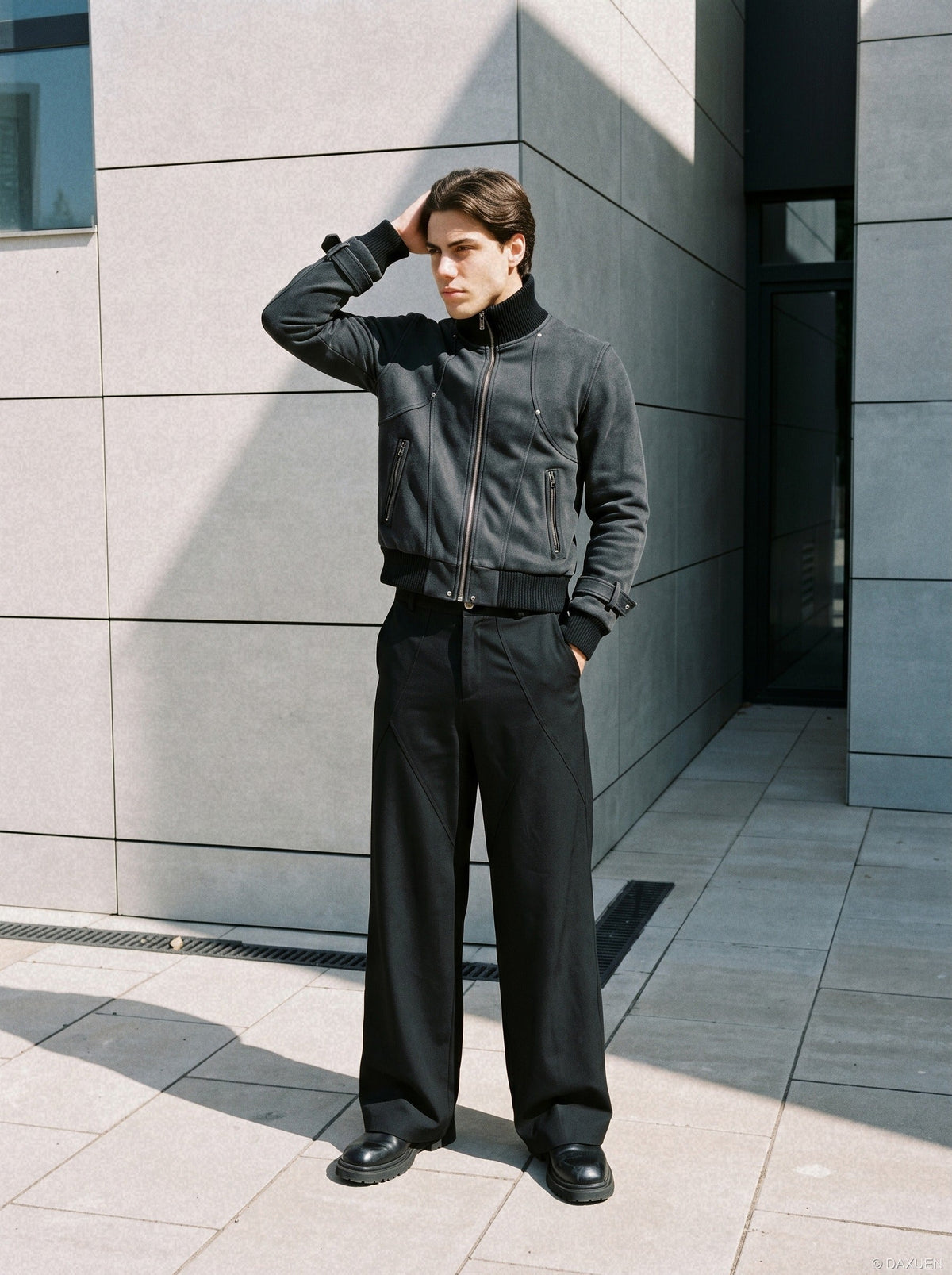 Front view of a washed dark grey rivet bomber jacket