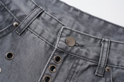 Angled view of grey wide-leg jeans with metal eyelet detailing