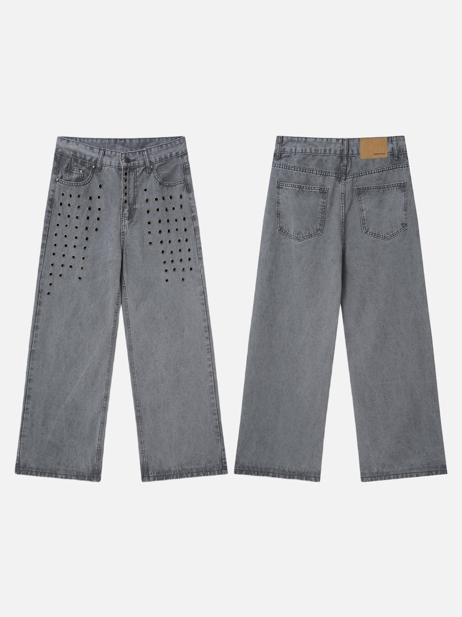 Back pocket detail on washed grey wide-leg denim jeans