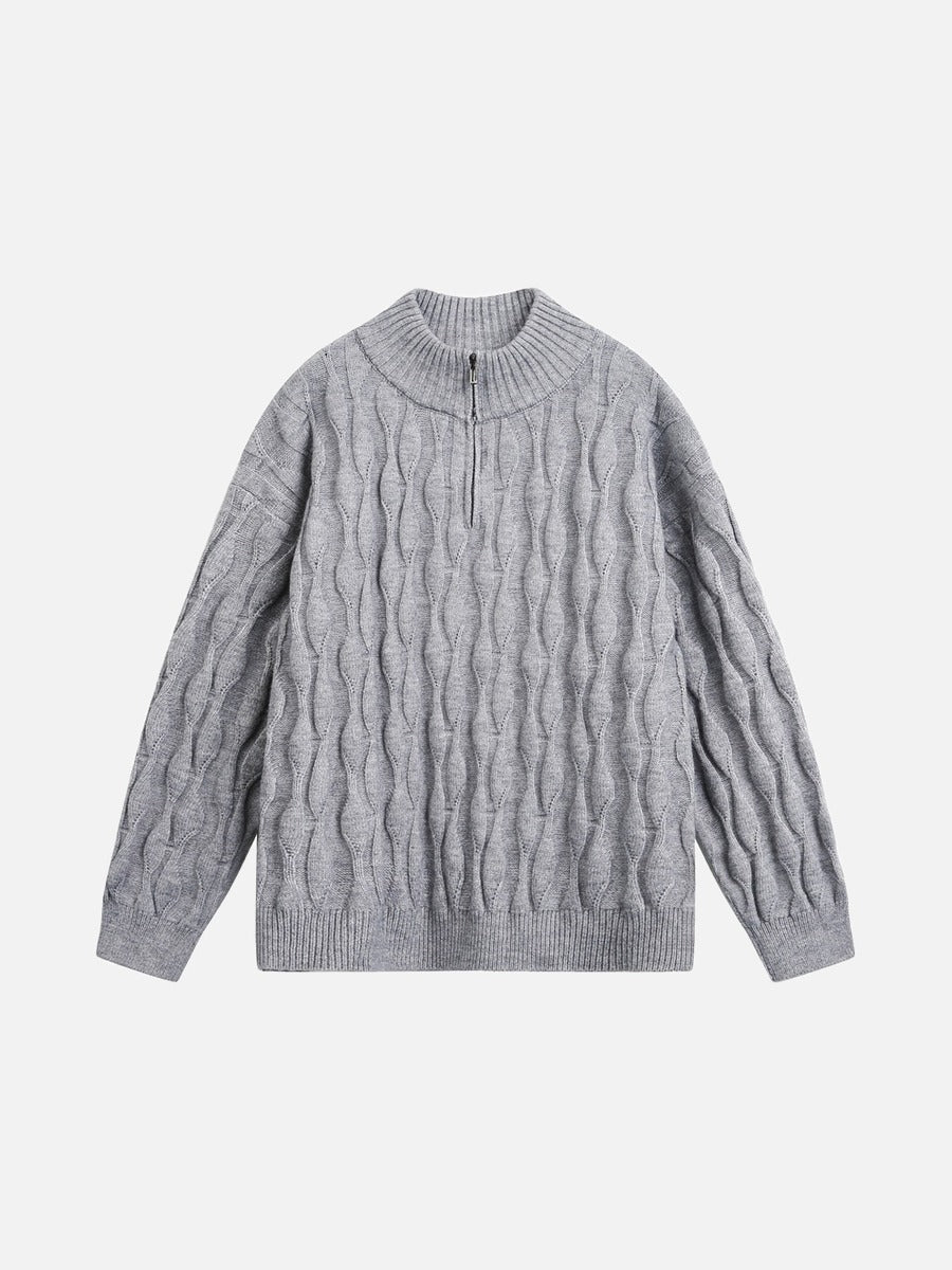 Wavy cable knit mock neck jumper shown from the front