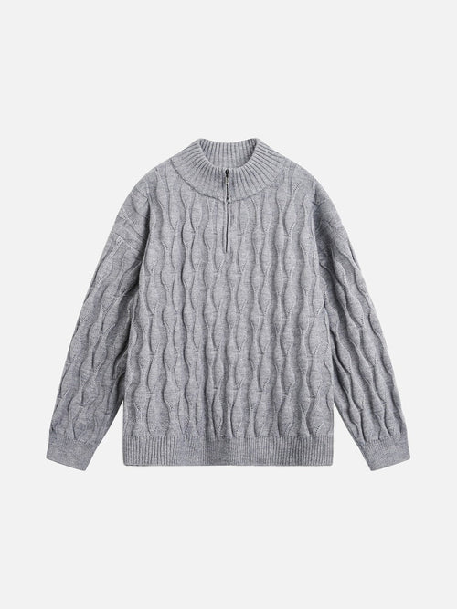 Wavy cable knit mock neck jumper shown from the front