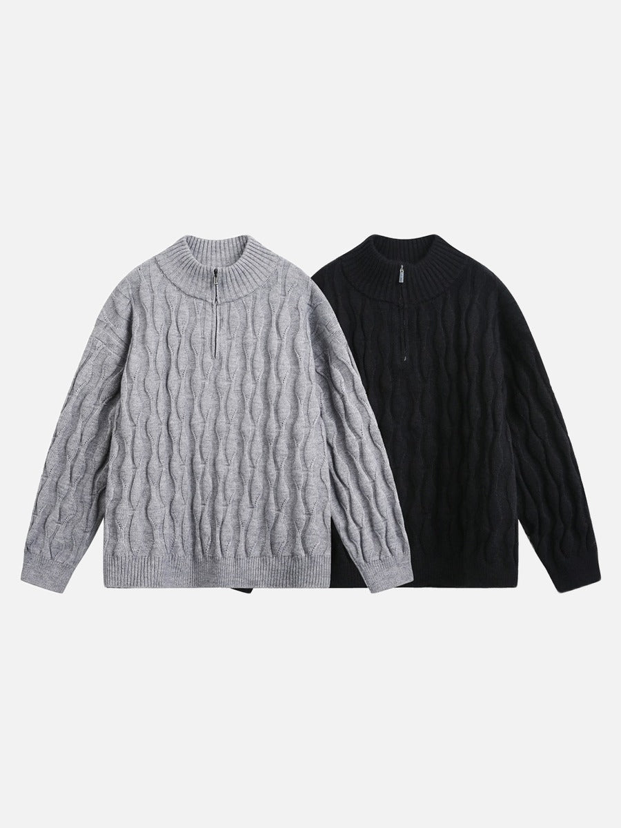 Wavy cable knit jumper showing the hem and relaxed shape