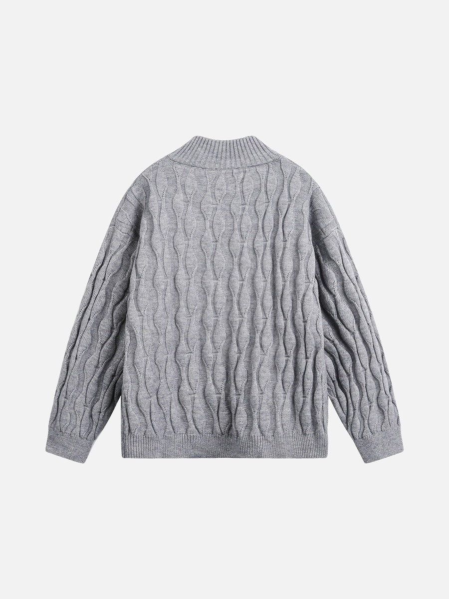 Detailed view of the jumper’s ribbed mock neck