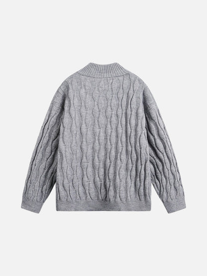 Detailed view of the jumper’s ribbed mock neck