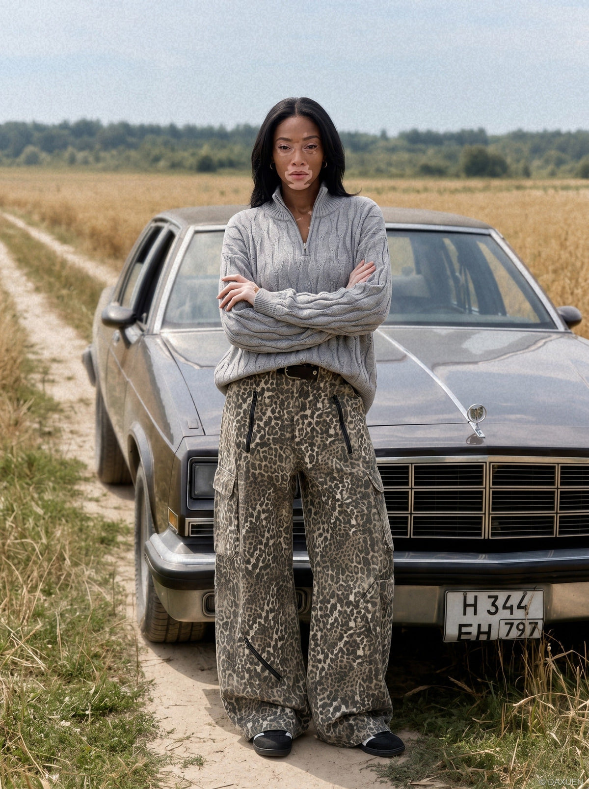 Side view of the mock neck cable knit jumper