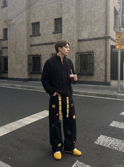 Wavy cable knit jumper shown from the back