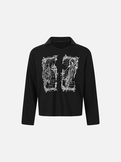 Back view of oversized graphic knit top showing wing-inspired graphic detail