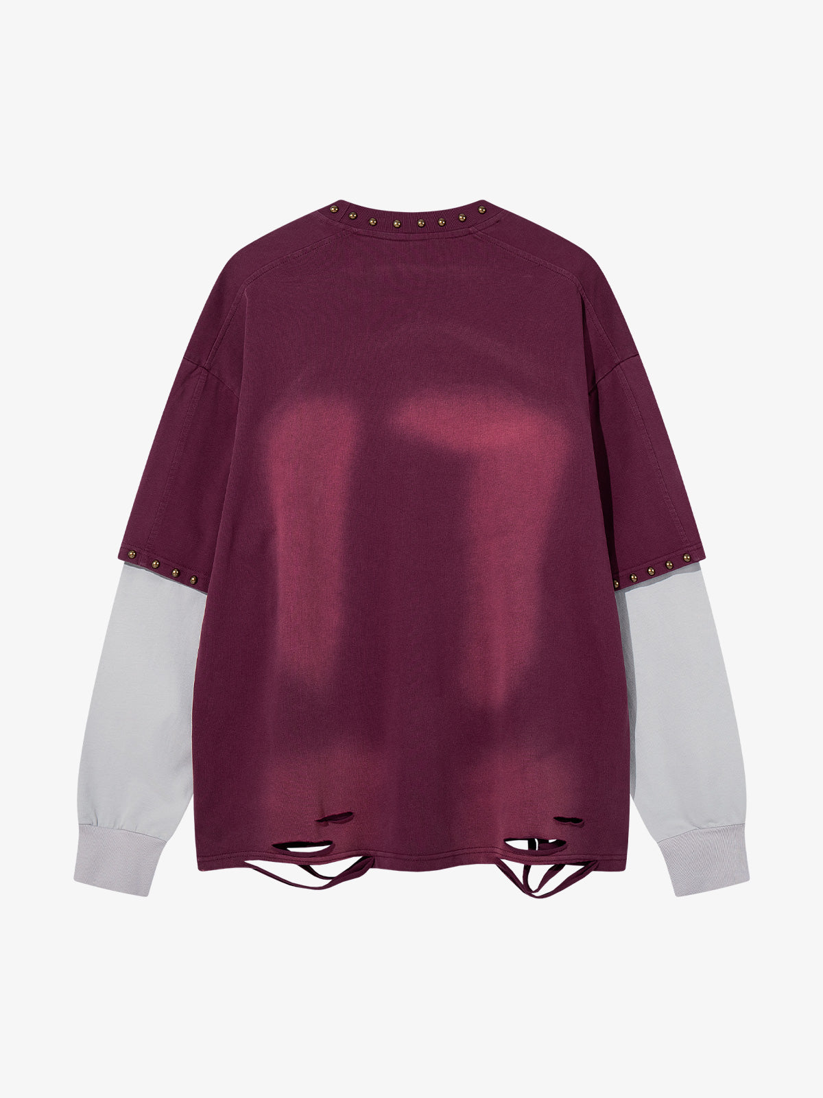 Detail view of the studded flame design on the front of the T-shirt