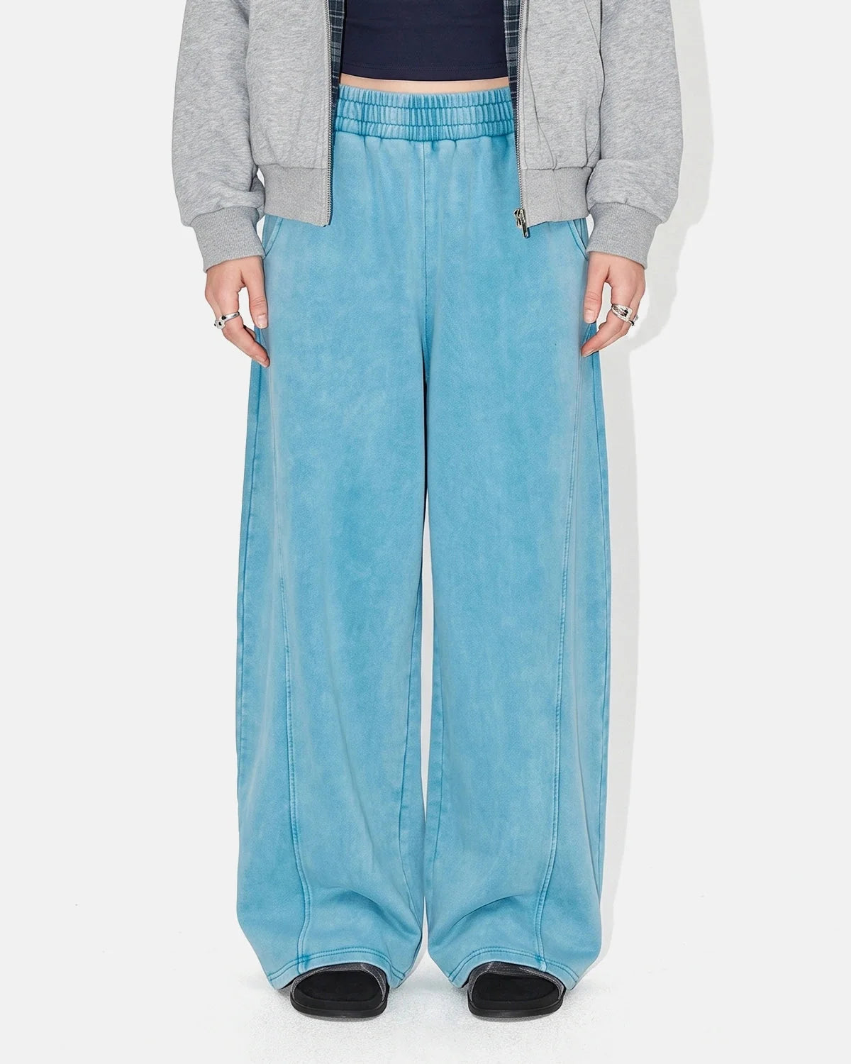 Acid-washed barrel sweatpants shown from the back
