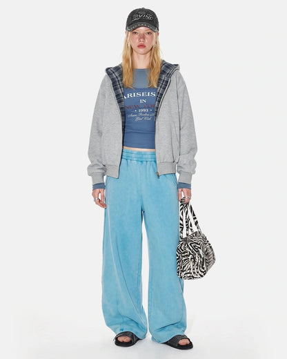 Close-up of the barrel-leg shape on the sweatpants