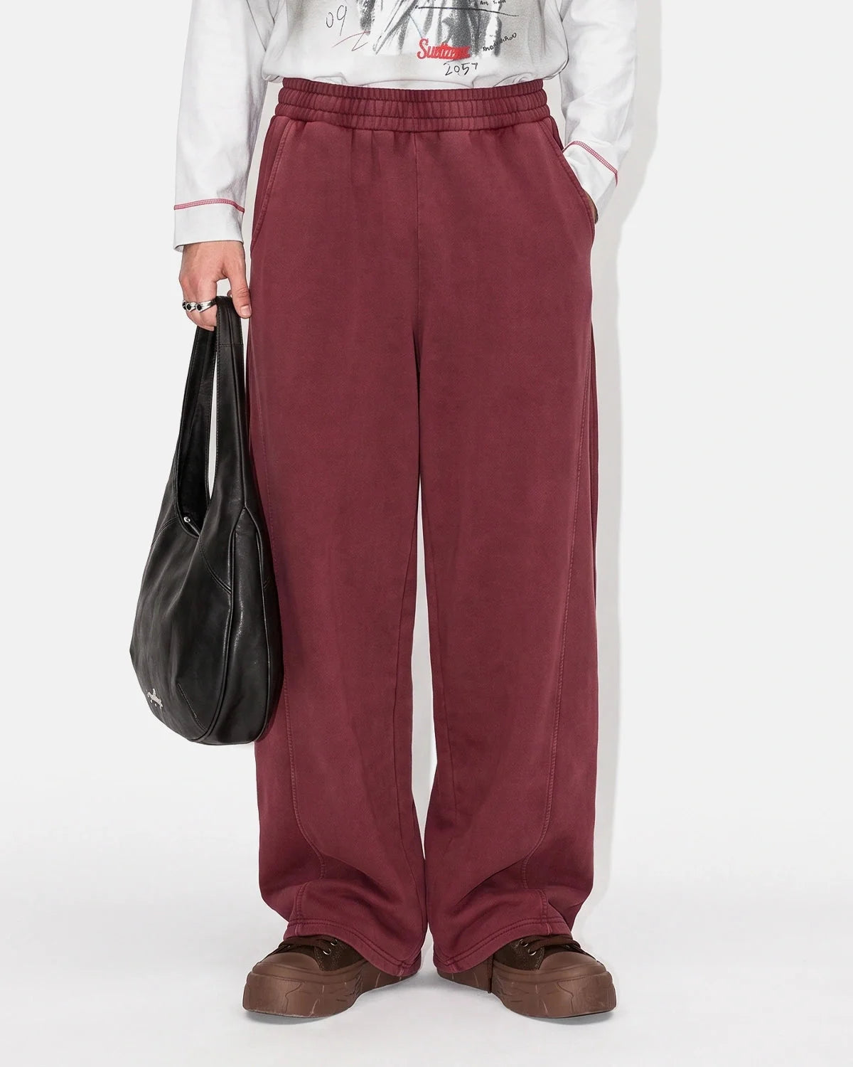 Pocket detail on the acid-washed barrel sweatpants