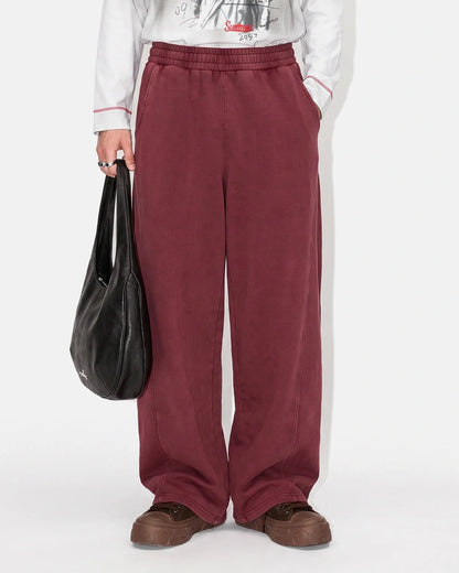 Pocket detail on the acid-washed barrel sweatpants