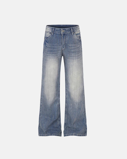 Close-up of embroidered detailing on bootcut jeans