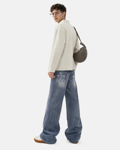 Full-length view of embroidered bootcut jeans
