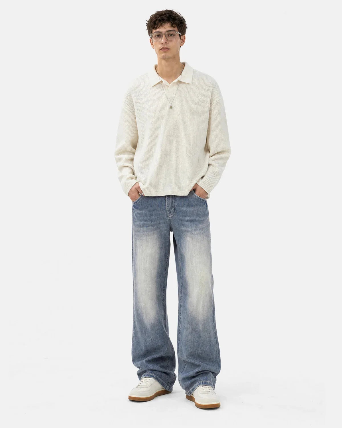 Back view of bootcut jeans showing embroidered detailing
