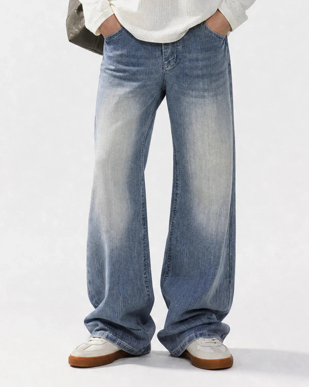 Bamboo-weave detail featured on embroidered bootcut jeans