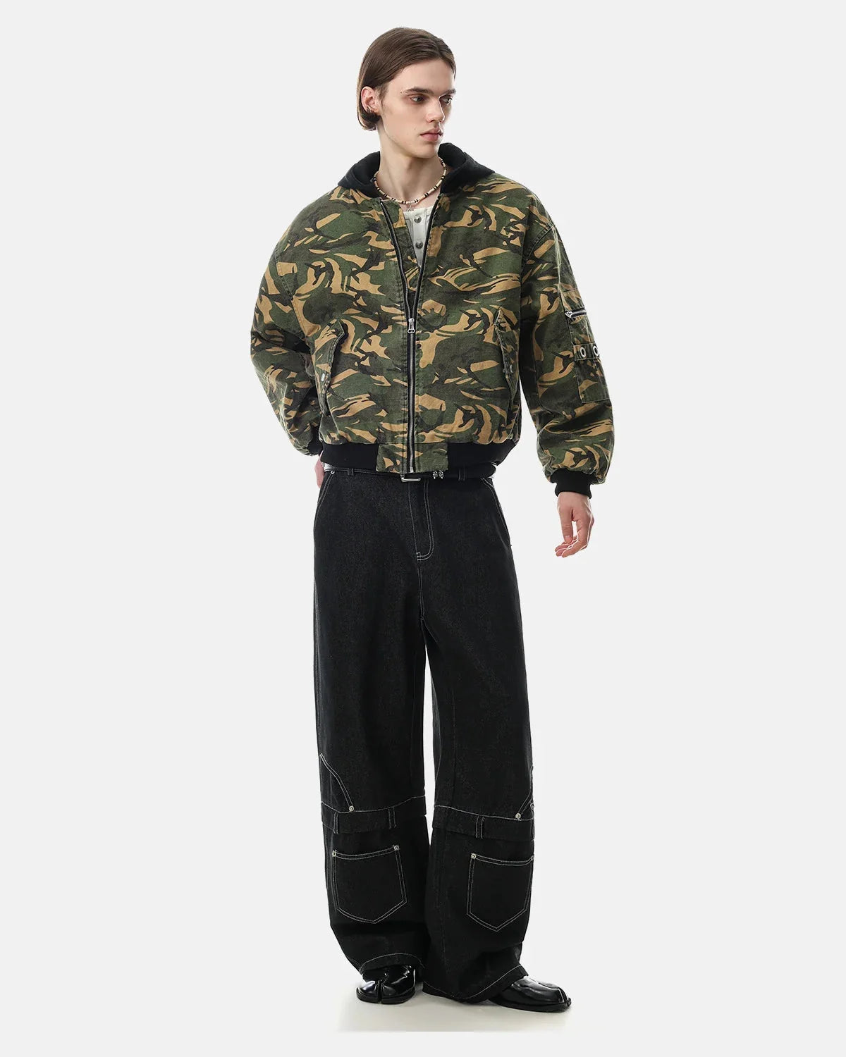 Camo hooded bomber jacket showing the sleeve detail