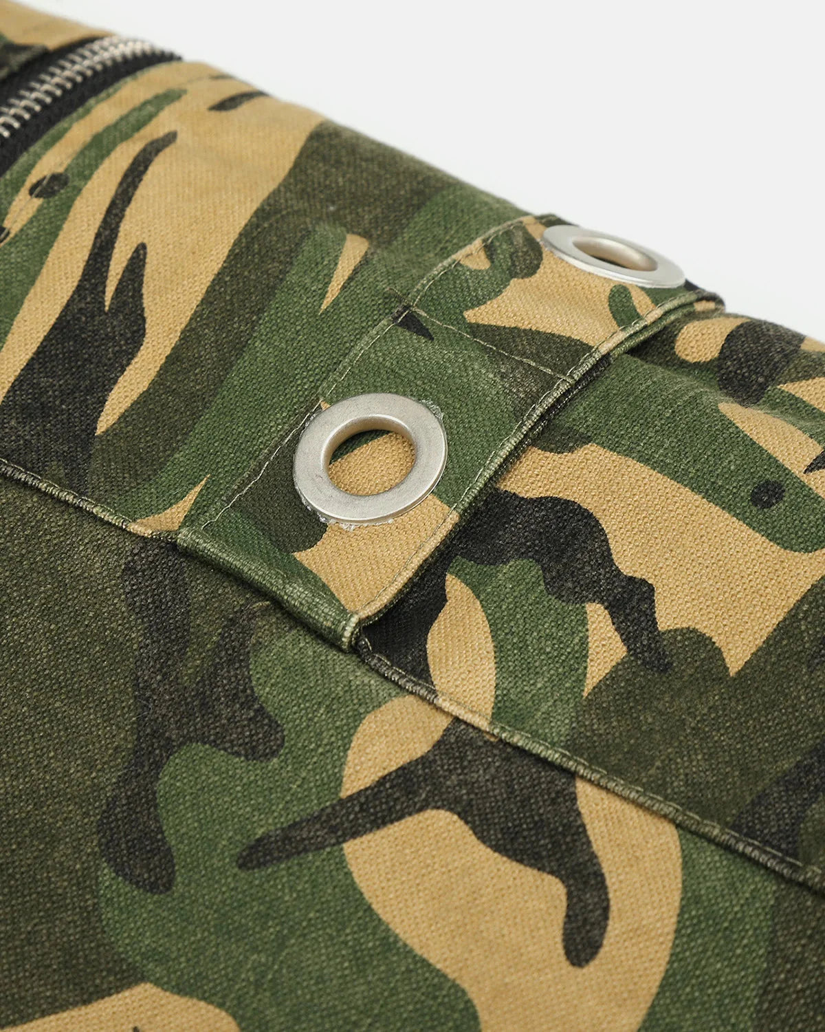 Close-up of the camo pattern on a bomber jacket