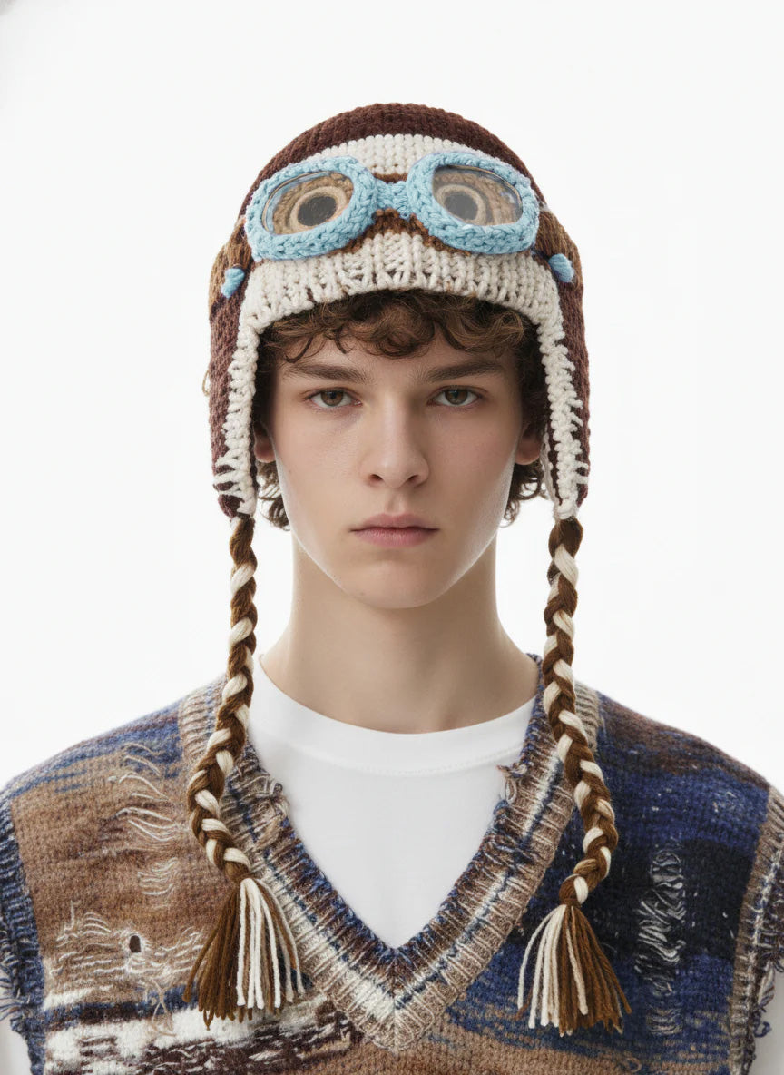 Crochet trapper hat displayed to show its structured shape and ear flaps
