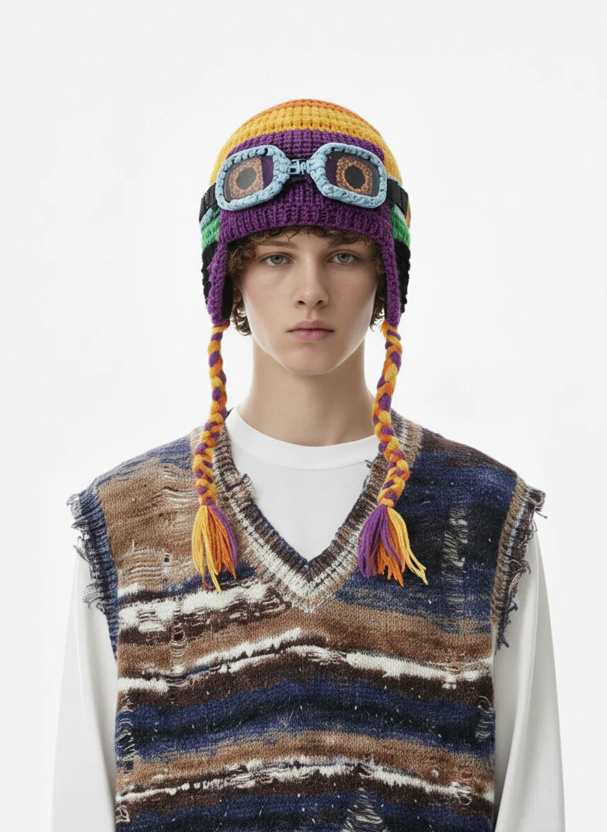 Detailed view of the ear flap and crochet stitching on the trapper hat