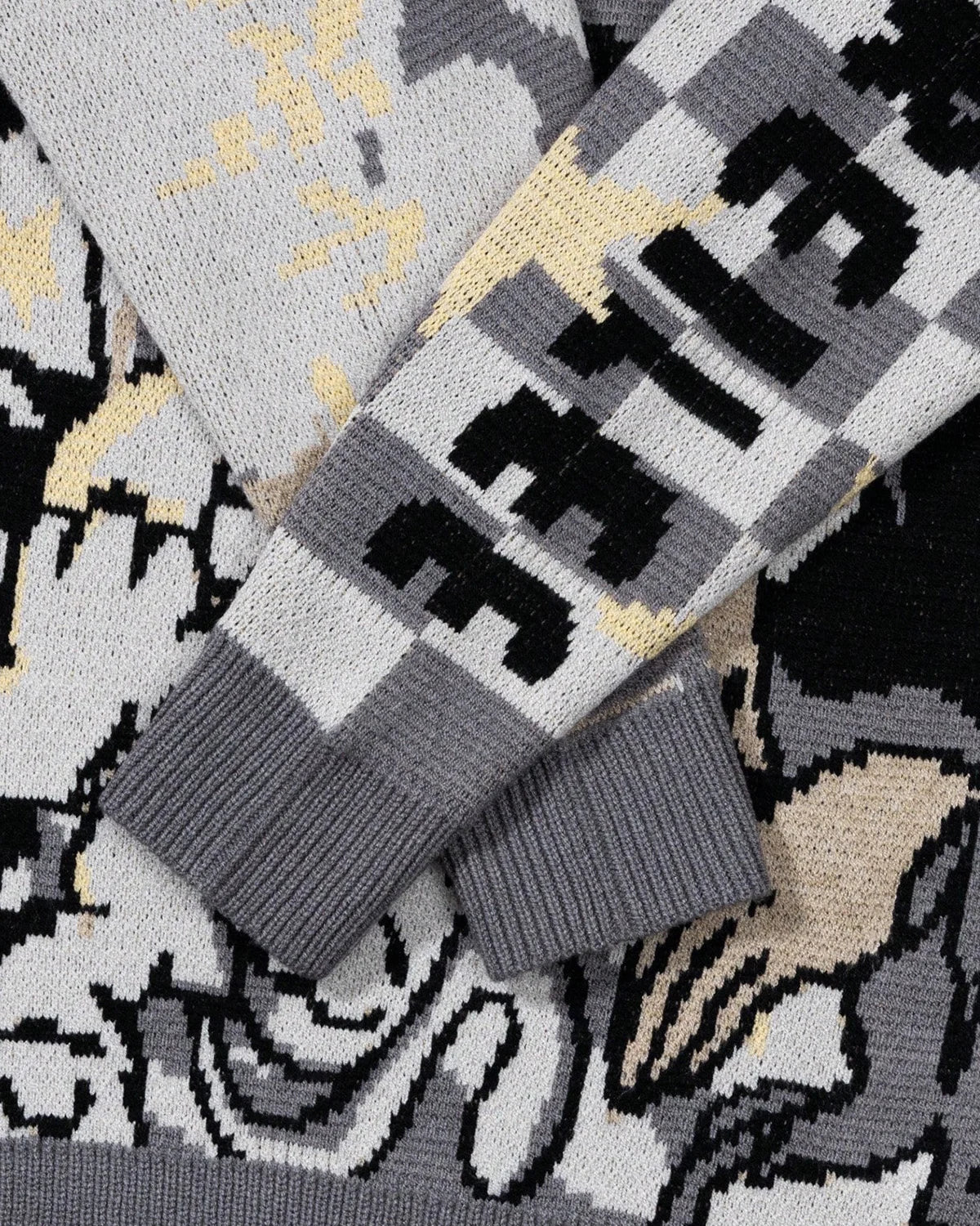 Full-length view of the comic graphic knitted jumper