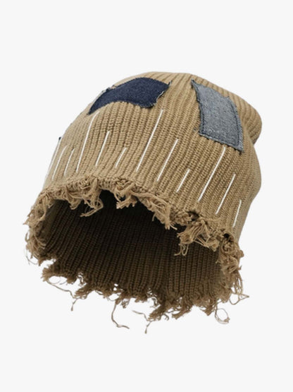 Front view of a distressed denim beanie streetwear hat