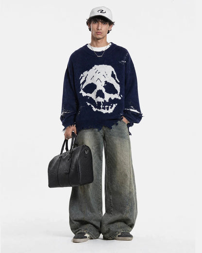 Sleeve detail on the distressed skull knit sweater