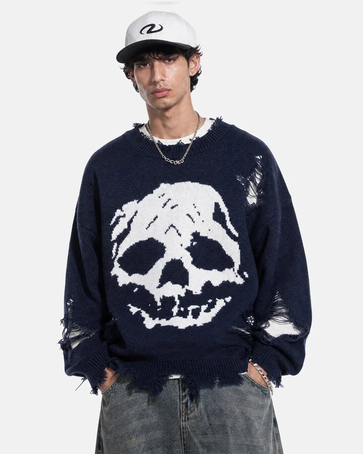 Back view of the distressed skull knit sweater