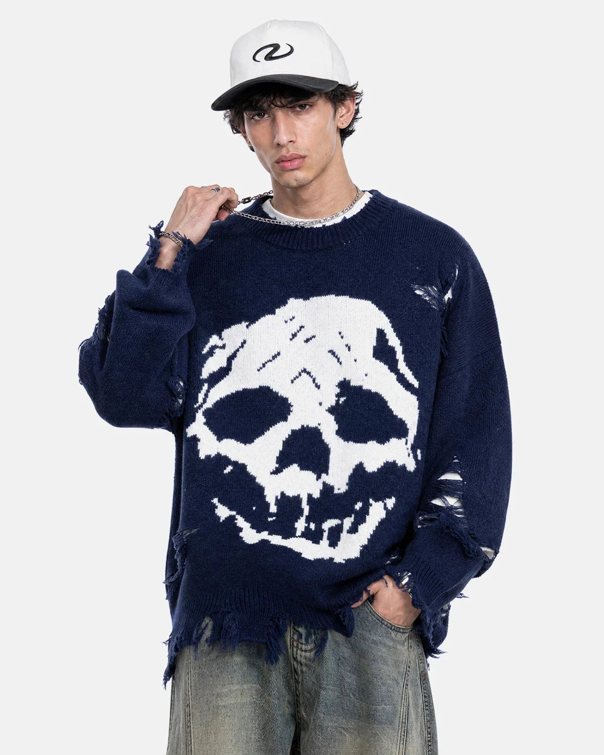 Detailed view of the sweater neckline and knitted finish