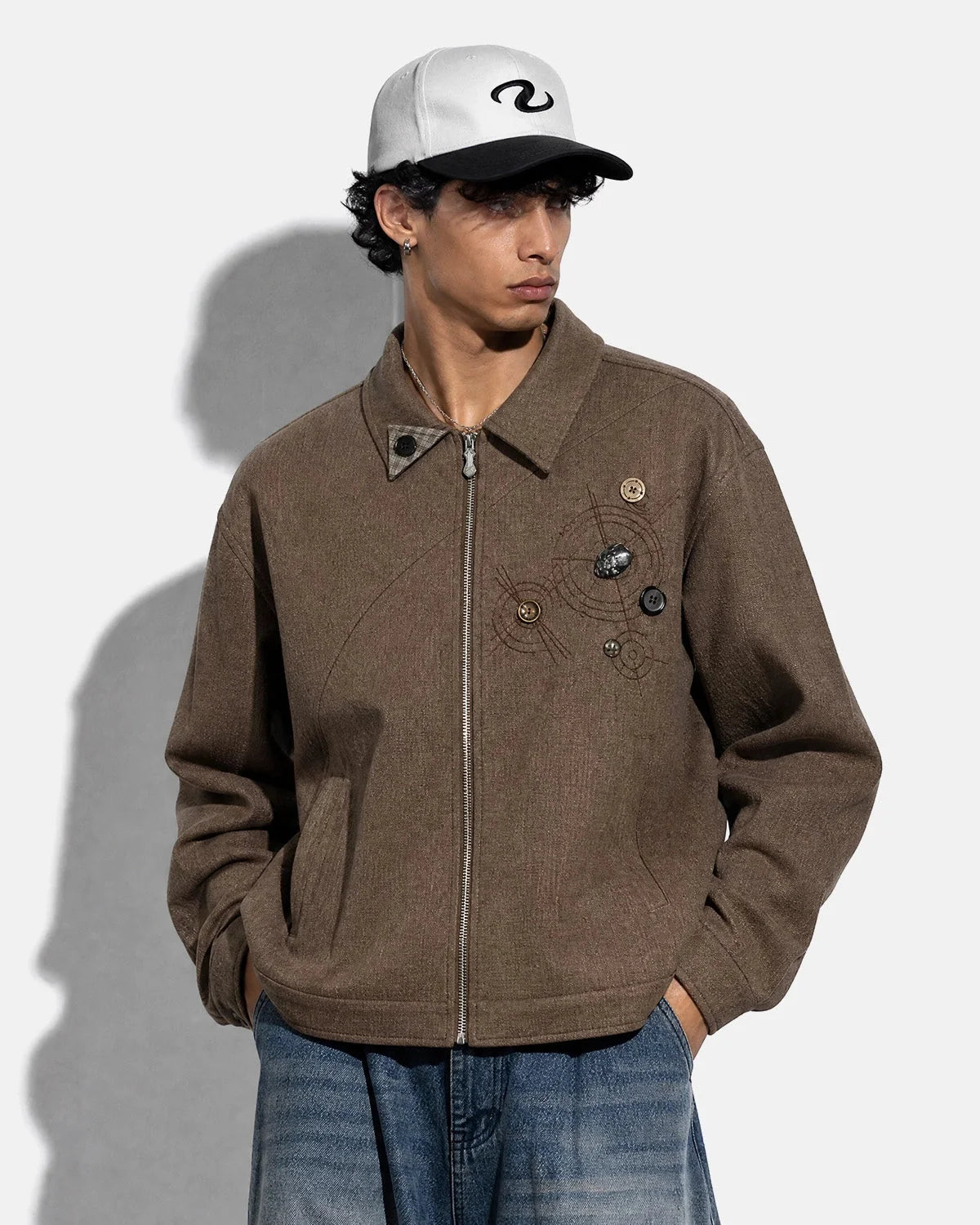 Boxy streetwear jacket showing its structured workwear design