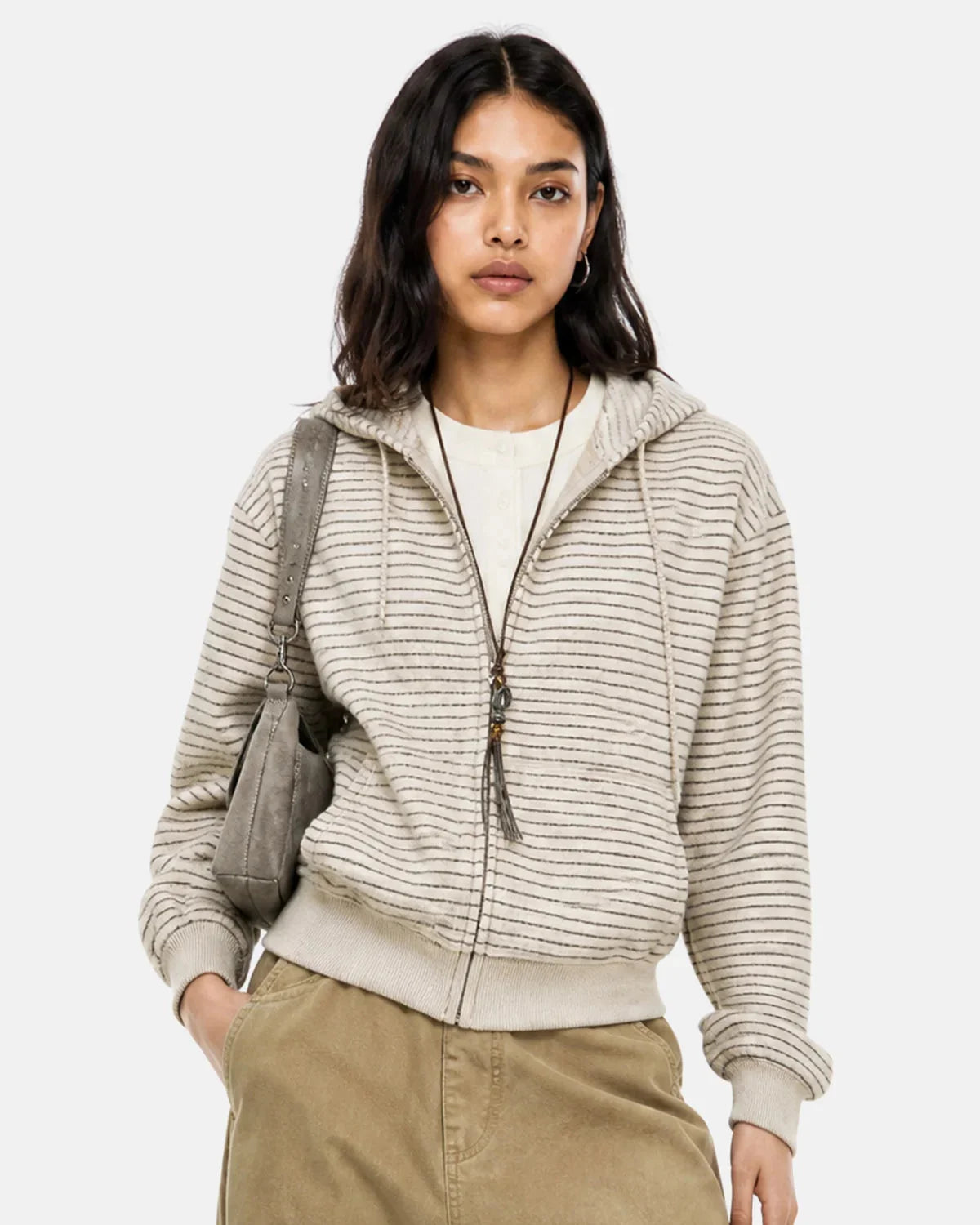 Cuffed sleeve detail on the relaxed fuzzy striped hoodie