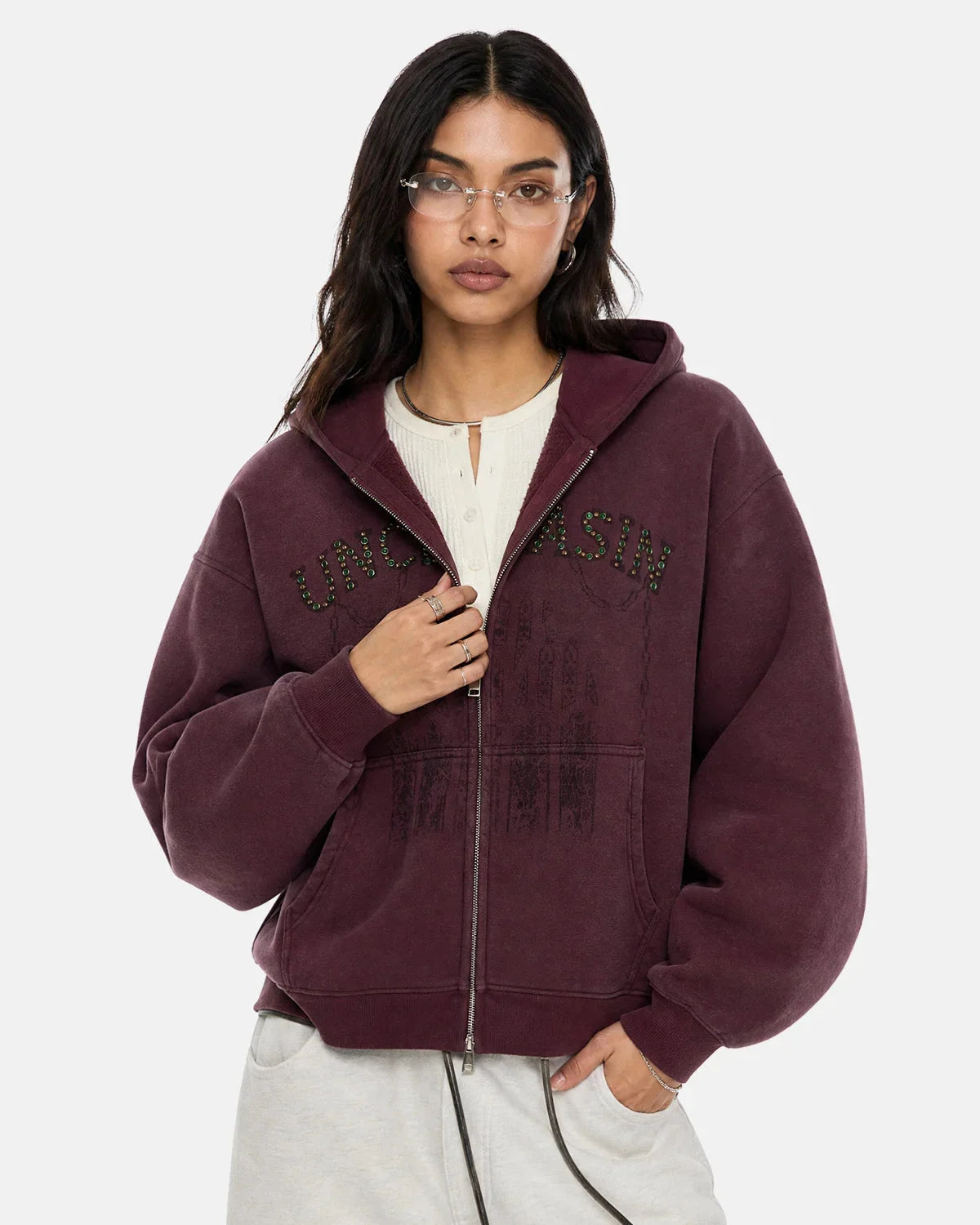 Front pocket detail on the washed zip-up hoodie