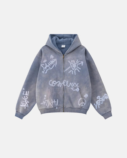 Washed graffiti zip-up hoodie shown from the front