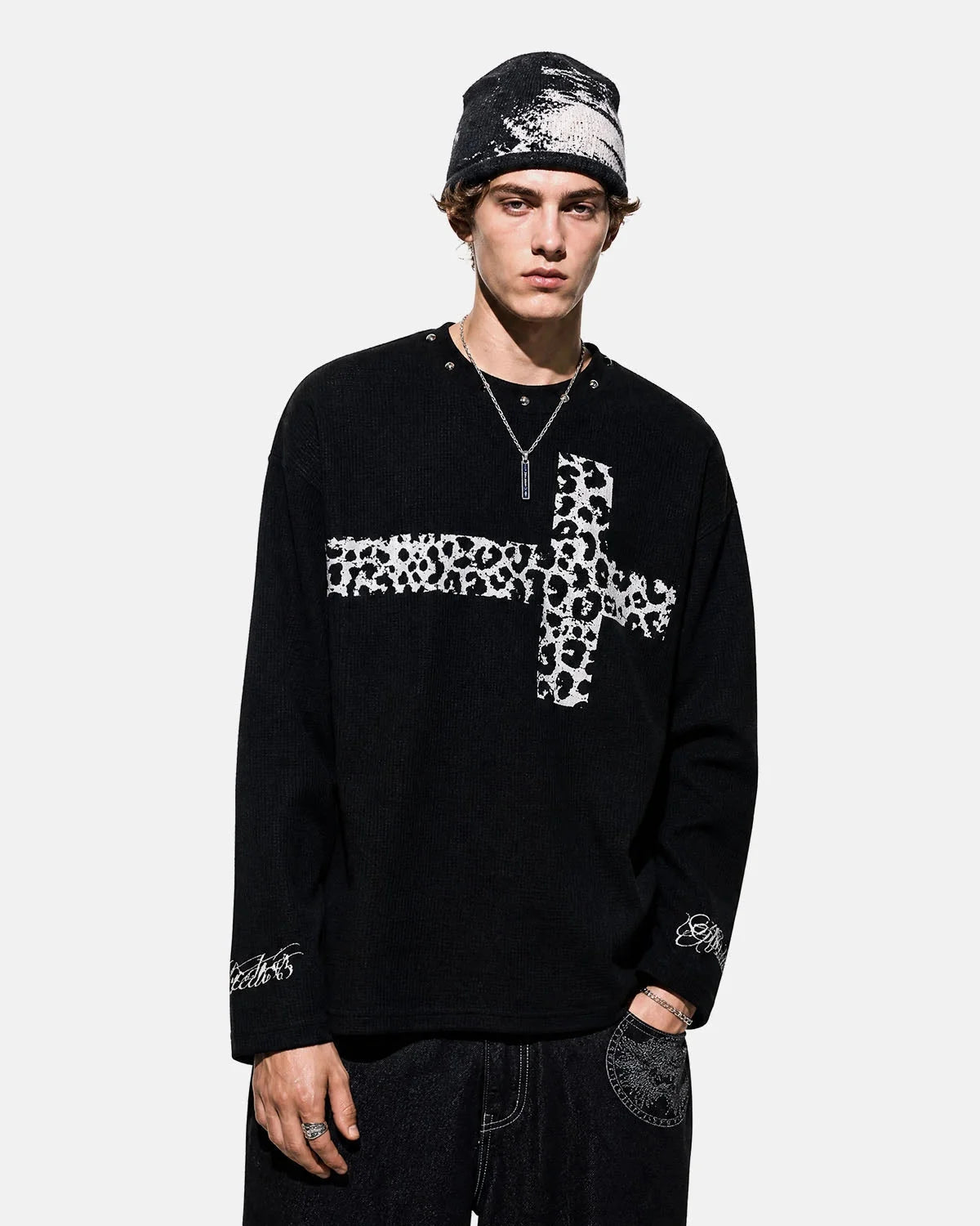 Bold cross graphic detail on the front of a waffle T-shirt