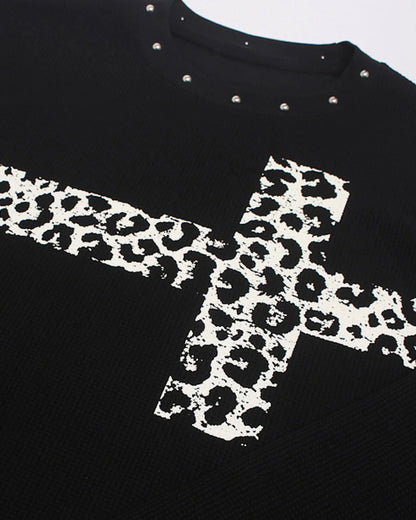 Casual leopard cross graphic T-shirt shown in a relaxed streetwear style