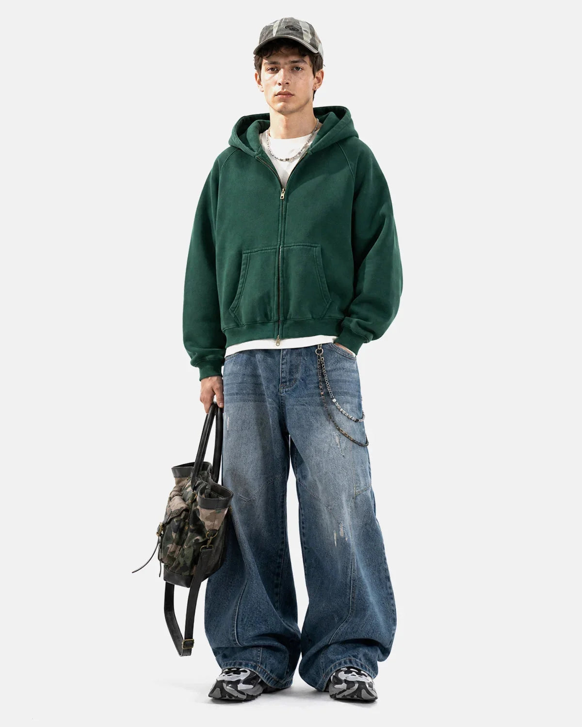 Side view showing the relaxed boxy fit of the hoodie
