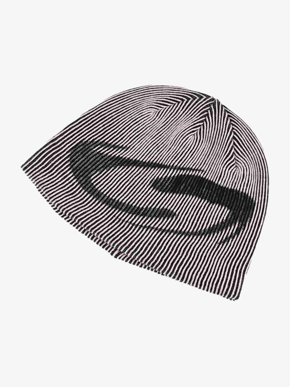 Close-up view of the beanie's striped knit texture and graphic design