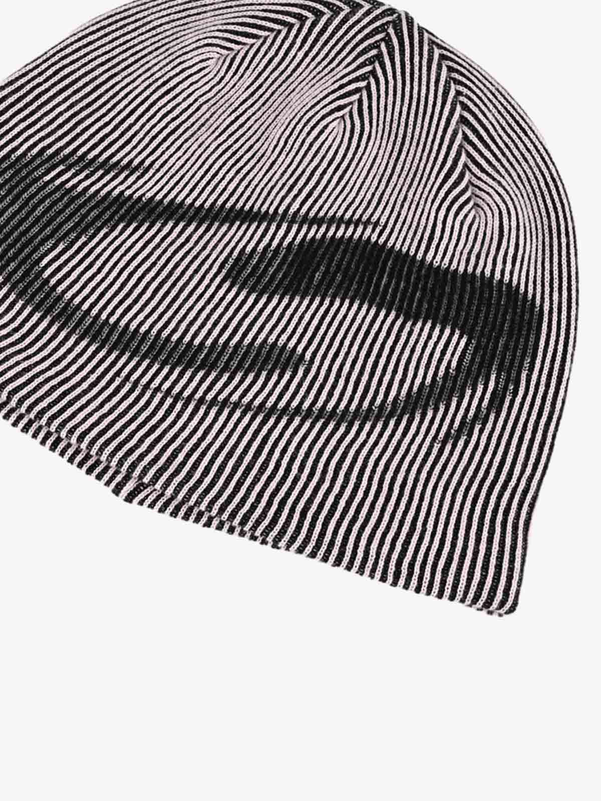 Knit beanie showing its structured shape and distinctive spike detail